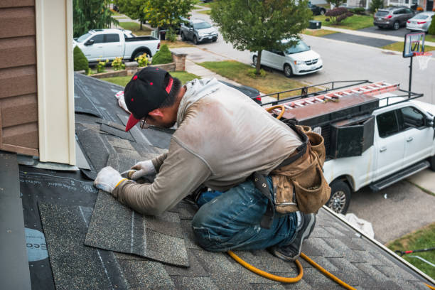 Professional Storm Damage Roof Repair technician working in Caledonia, MI